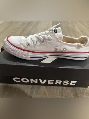 Converse White Low-Top Canvas Sneaker with red trim.